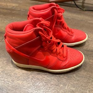Bright red Nike sky high shoes